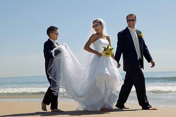 millennial persona at beach wedding