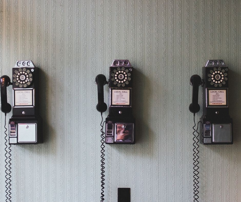 Series of telephones on wall waiting for listening