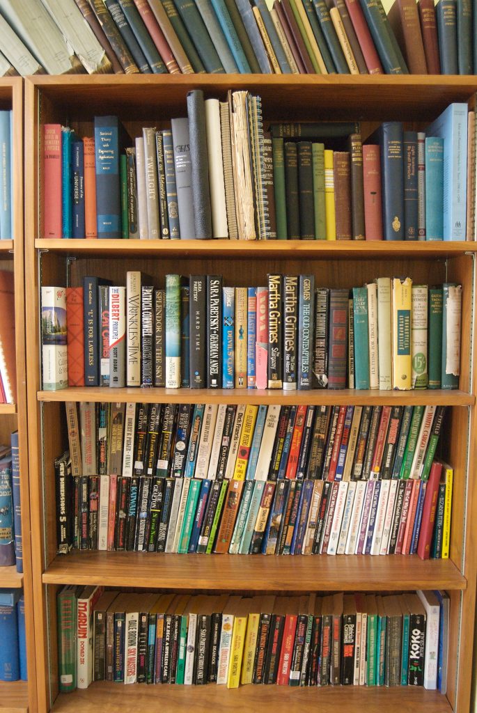 wooden shelf with library books